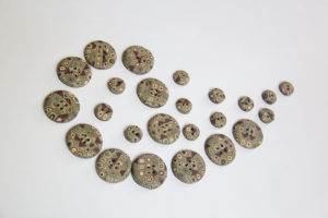 A set of polymer clay buttons