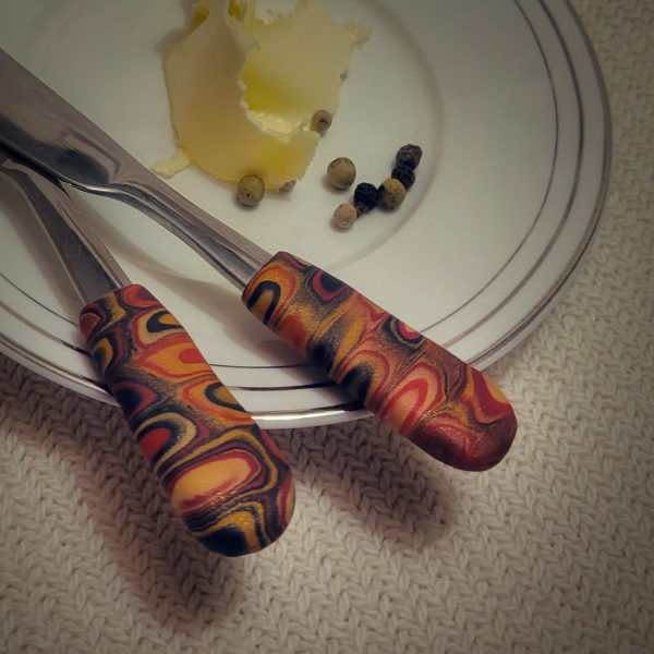 Gold, Red, and Black Spreader – Butter Knife