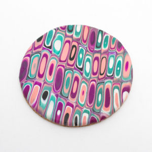 Set of coasters in pink, green, and fuchsia