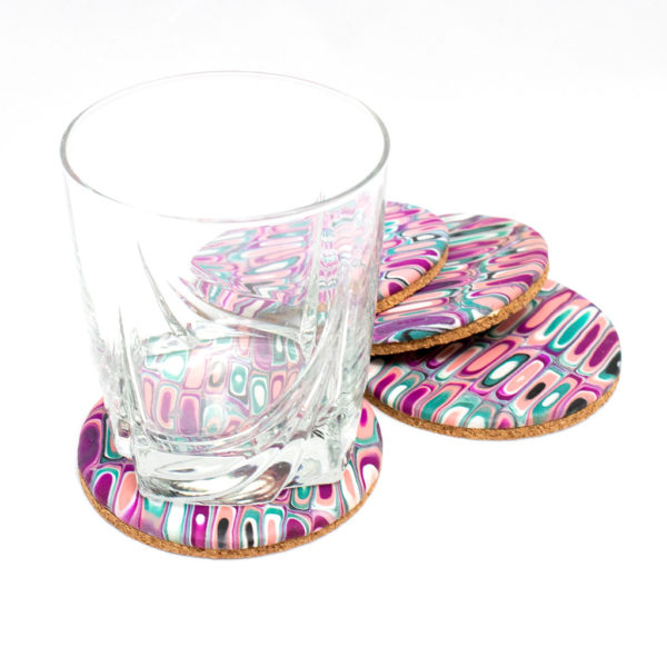 Set of coasters in pink, green, and fuchsia