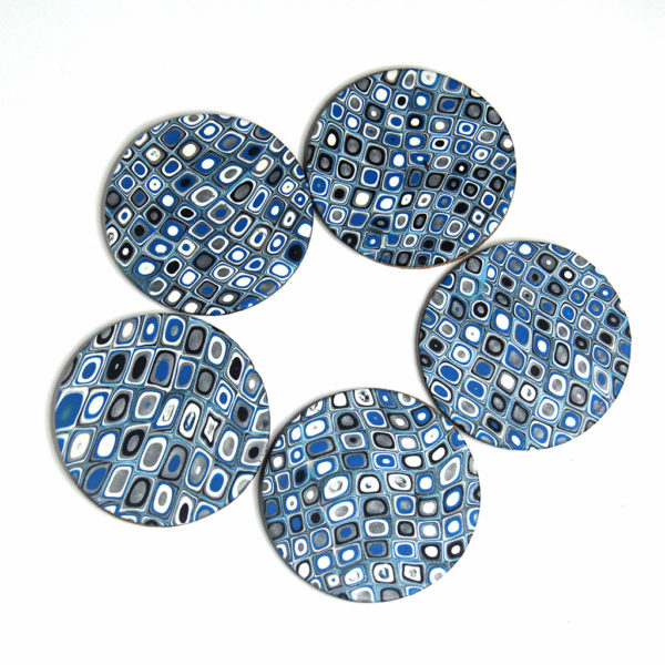 Set of Coasters in Blue, White, Silver, and Black