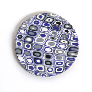 Set of Coasters in Purple, White, Silver, and Black