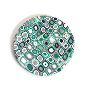 Set of Coasters in Green, White, Silver, and Black